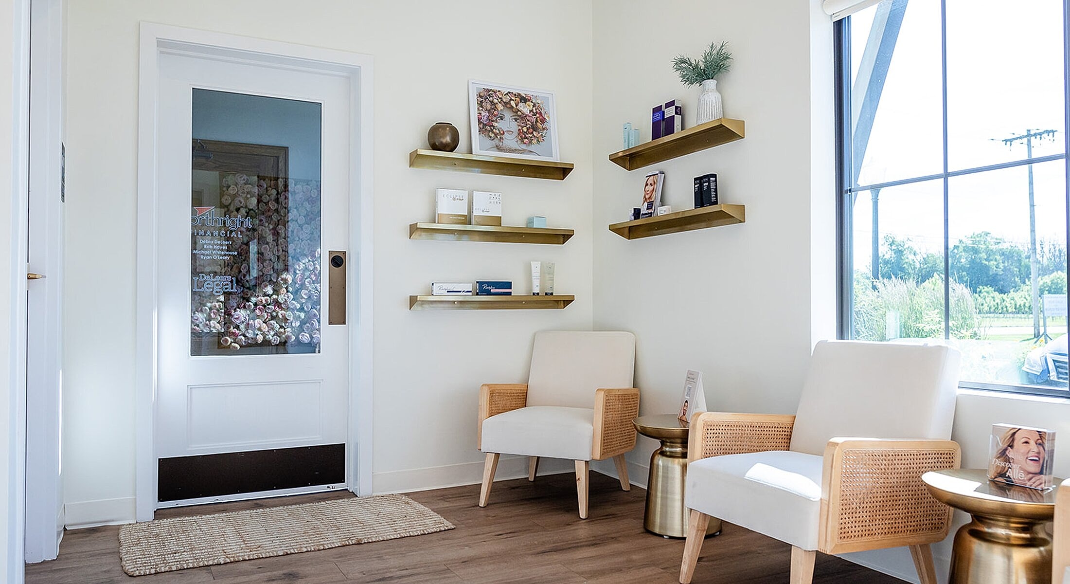 Modern waiting area with shelves and chairs.
